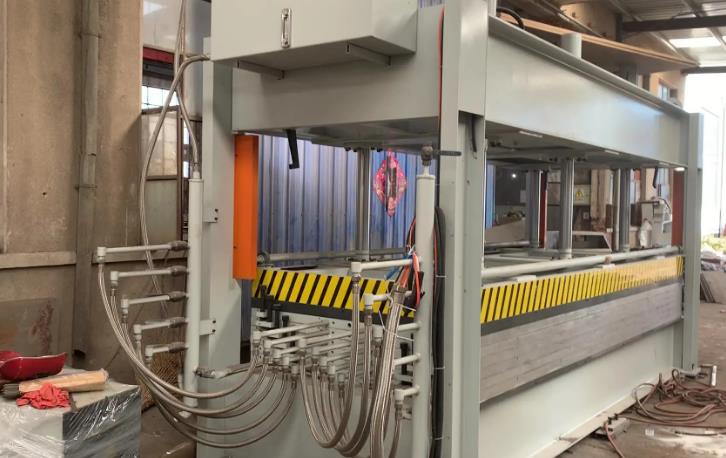 What is the pressure of plywood hot press
